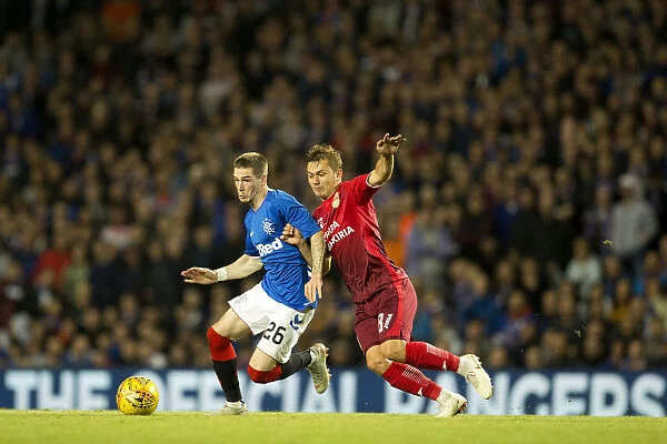 Rangers vs FC Ufa: Glenn Middleton vs Catalin Karp's Intense Europa League Play-Off Battle at Ibrox Stadium