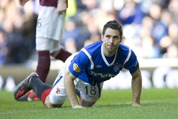 Rangers vs Hearts: Carlos Bocanegra's Heartbreaking Goal (1-2) in the Clydesdale Bank Scottish Premier League Clash at Ibrox Stadium