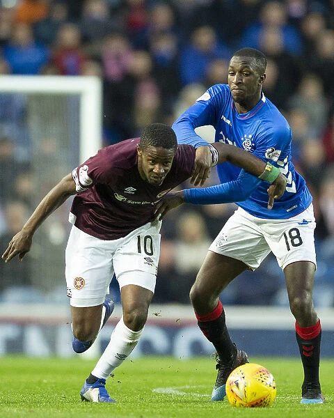 Rangers vs Hearts: Glen Kamara Holds Back Arnaud Djoum at Ibrox Stadium