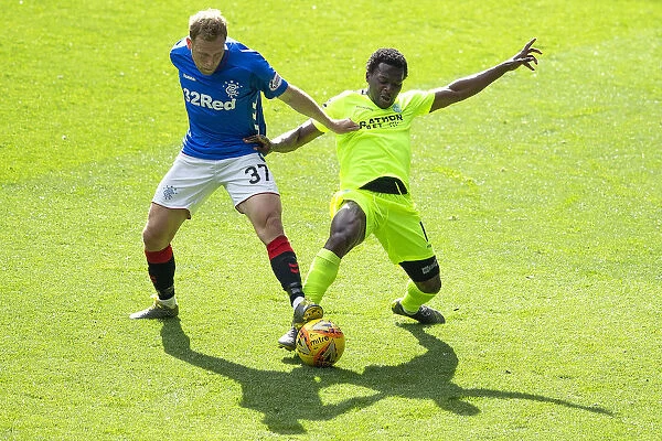 Rangers vs Hibernian: Scott Arfield vs Thomas Agyepong Clash in the Scottish Premiership at Ibrox Stadium