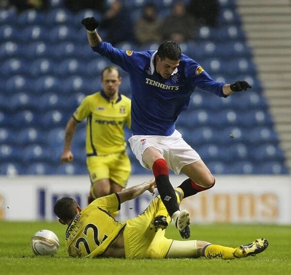 Rangers vs Kilmarnock: Kyle Lafferty Tackled by Liam Kelly in Intense Scottish Cup Fourth Round Clash at Ibrox (3-0)