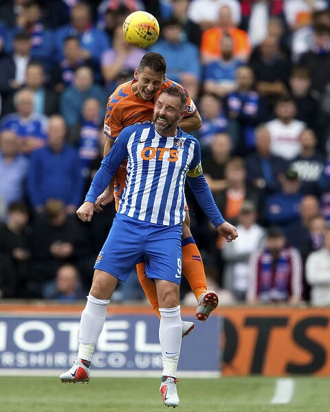 Rangers vs Kilmarnock: Thrilling Moment - Nikola Katic Soars Over Kris Boyd in Betfred Cup Showdown at Rugby Park