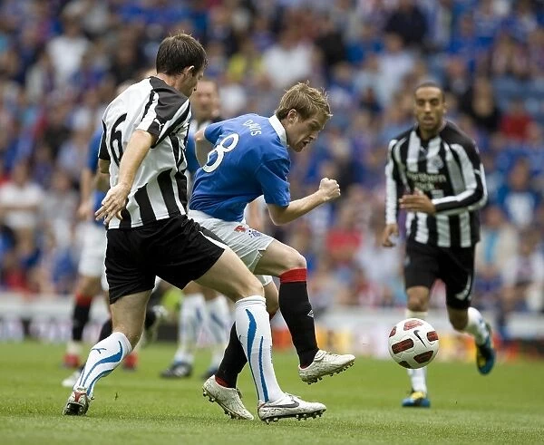 Rangers vs Newcastle United: Steven Davis vs Mike Williamson - Intense Tackle in Ibrox Pre-Season Friendly (2-1)