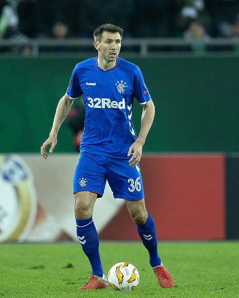Rangers vs Rapid Vienna: Gareth McAuley in Action at Europa League Group G - Allianz Stadion