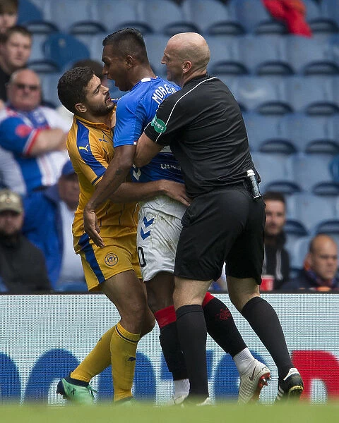 Rangers vs Wigan Athletic: A Fiery Face-Off Between Alfredo Morelos and Samy Morsy at Ibrox Stadium
