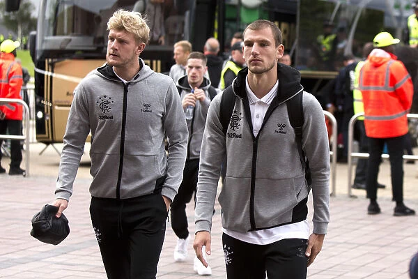 Rangers Worrall and Barisic Arrive at Celtic Park for Epic Premiership Showdown