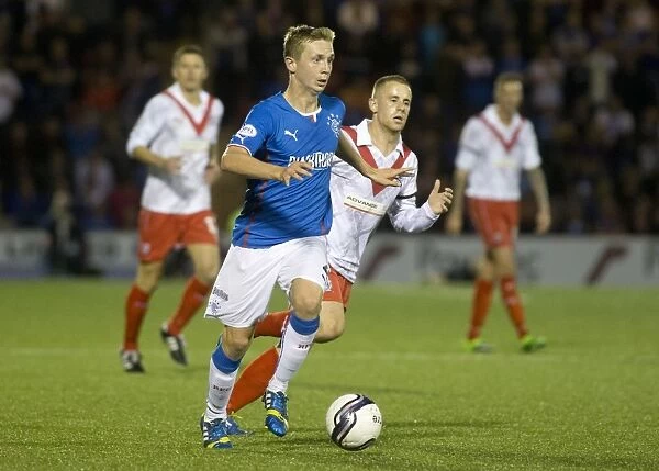 Robbie Crawford in Action: Rangers Dominance over Airdrieonians in Scottish League One (6-0)