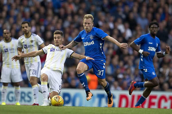 Scott Arfield Fights for Ball: Rangers vs NK Maribor - UEFA Europa League Qualifier at Ibrox