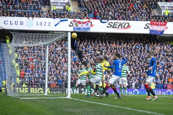 Scott Brown's Close Call: Heading Towards the Crossbar in the Intense Rangers vs Celtic Rivalry at Ibrox Stadium