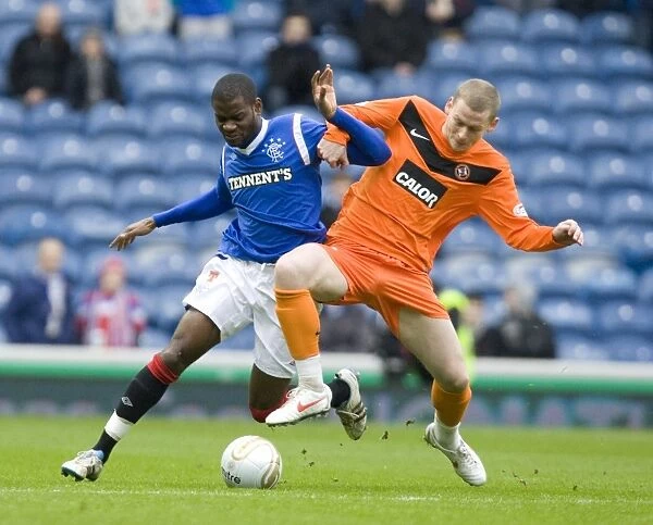 Scott Robertson vs Maurice Edu: Dundee United's 2-0 Victory over Rangers in the Scottish Cup Fifth Round at Ibrox Stadium