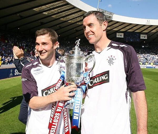 Scottish Cup Victory 2008: Thomson and Weir Celebrate with the Trophy
