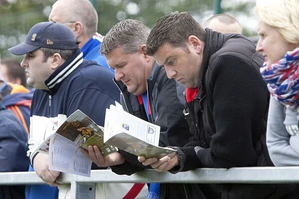 A Sea of Blue and White: Rangers Fans Unwavering Support at Annan Athletic's Galabank Stadium