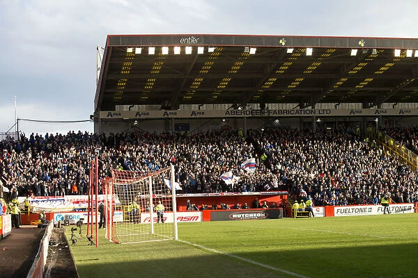 A Sea of Passion: Rangers Fans United in Triumph at Pittodrie Stadium - Scottish Cup Champions 2003