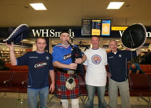 Soccer - Rangers Fans- Leaving for Barcelona- Glasgow Airport