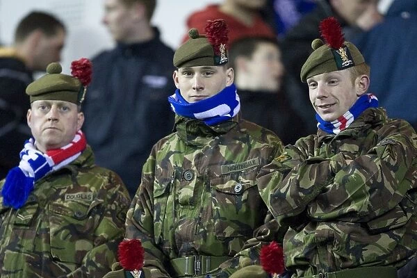 Soldiers in the Stands: Rangers vs. Sporting Lisbon at Ibrox Stadium - UEFA Europa League Round of 32 (1-1)