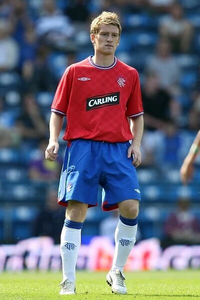 Steven Davis Faces Off: Rangers Victory Over Portsmouth (2-0) at Fratton Park