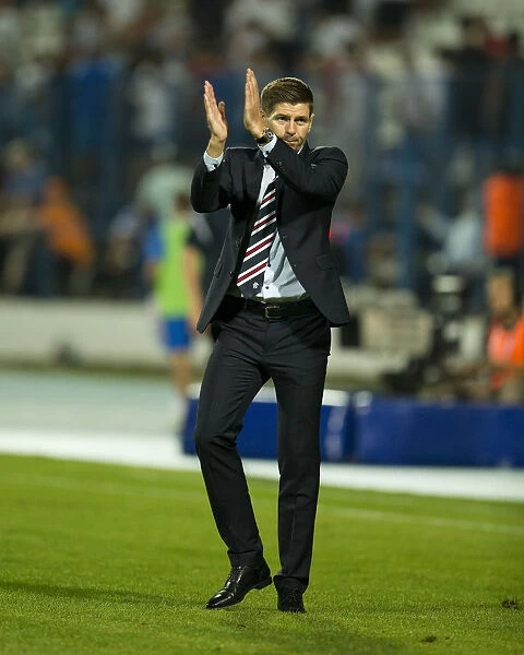 Steven Gerrard's Triumphant Applause: Rangers Football Club's Europa League Victory over NK Osijek
