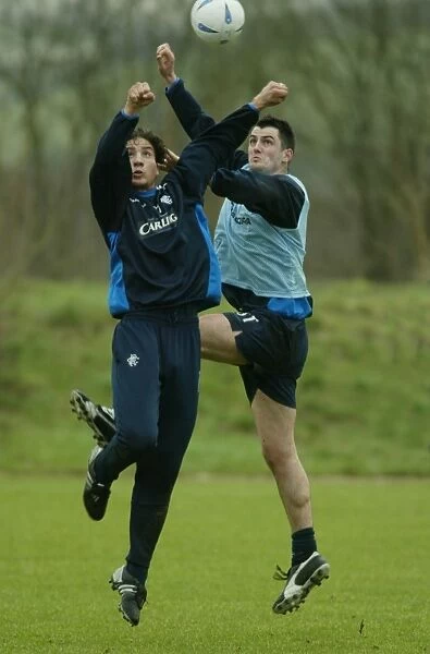 Steven Thompson and Hamed Namouchi in Focus: Training at Murray Park, February 2004
