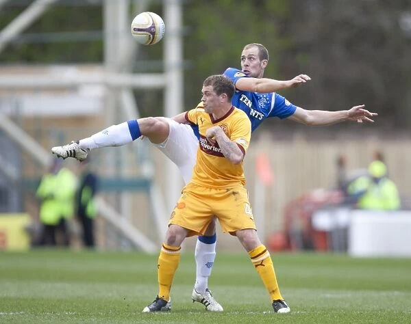 Steven Whittaker vs Nicky Law: A Clash at Fir Park - Rangers 1-2 Victory over Motherwell in the Scottish Premier League