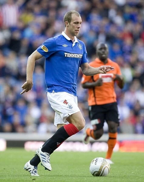 Steven Whittaker's Stellar Performance: Rangers 4-0 Dundee United in the Clydesdale Bank Scottish Premier League at Ibrox Stadium