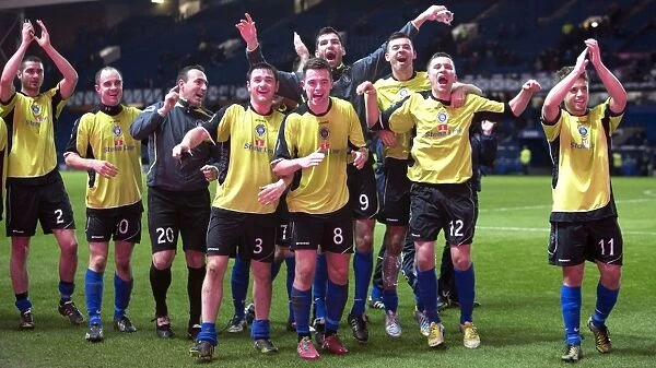 Stranraer Players Celebrate Shock Victory Over Rangers in Scottish League One at Ibrox Stadium