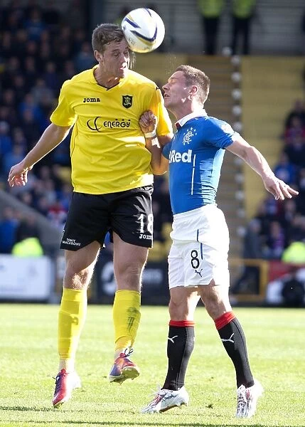 Tense Encounter: Ian Black and Jordan White Face Off Between Livingston and Rangers in Scottish Championship