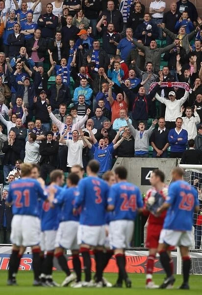 Thrilled Rangers FC Fans Erupt in Cheers at Easter Road during Hibernian vs Rangers - Clydesdale Bank Premier League Match