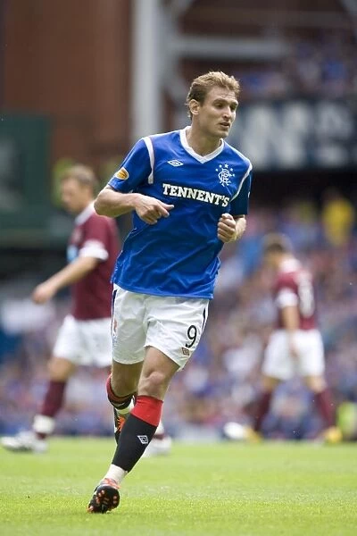 Thrilling 1-1 Stalemate at Ibrox: Jelavic's Dramatic Equalizer for Rangers vs Hearts (Scottish Premier League)
