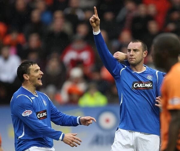 Thrilling 2-2 Draw: Kris Boyd's Double Strike for Rangers vs Dundee United in the Clydesdale Bank Premier League