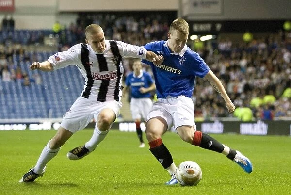 Thrilling 7-2 Victory for Rangers: Wylde vs McCann Clash in the CIS Insurance Cup Third Round at Ibrox Stadium