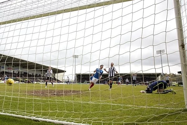Thrilling Goal: Rangers Jason Holt Scores Past St. Mirren's Jamie Langfield in Ladbrokes Championship Match