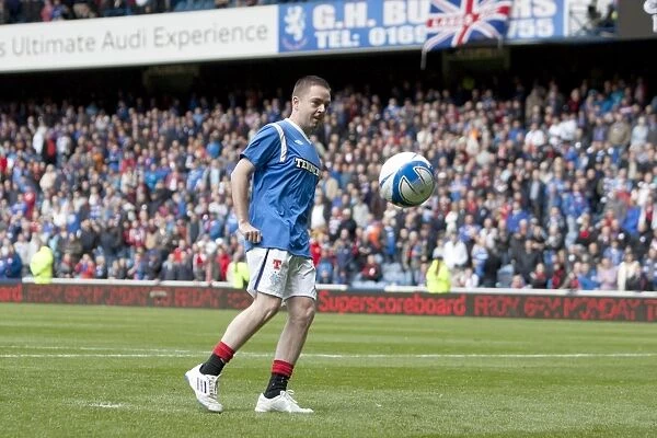 Thrilling Half-Time Penalty Showdown: Rangers Sponsors Battle it Out at Ibrox