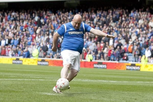 Thrilling Half-Time Penalty Showdown at Ibrox Stadium: Rangers Sponsors Battle It Out in Tense 0-0 Stalemate