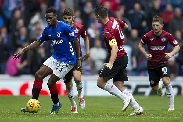 Thrilling Moment: Lassana Coulibaly in Action for Rangers at Ibrox