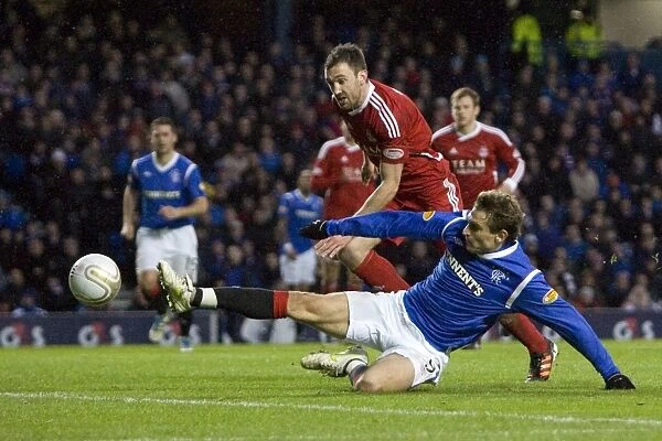 Thrilling Near-Miss: Jelavic Narrowly Heads Past Robertson at Ibrox - Rangers vs Aberdeen, 1-1 Clydesdale Bank Scottish Premier League
