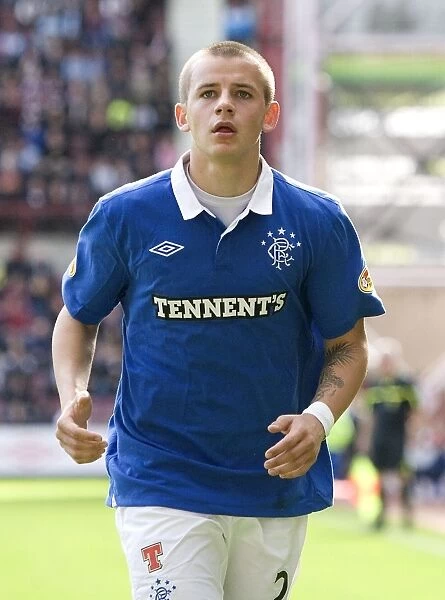 Thrilling Victory: Vladimir Weiss Scores the Decider for Rangers at Tynecastle (1-2)