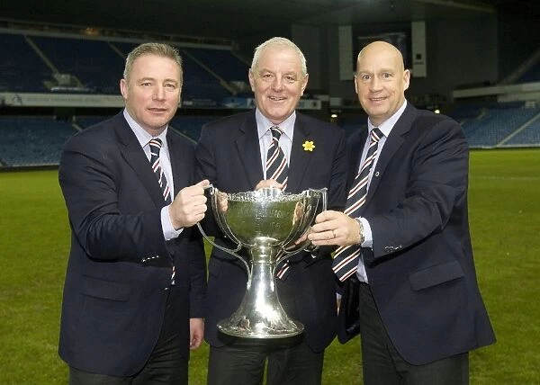 Triumphant Co-op Cup Victory: McCoist, Smith, and McDowall's Unforgettable Moment at Ibrox Stadium (2011)