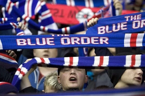 Triumphant Rangers Blue Order: Celebrating a 3-0 Victory at Ibrox Stadium