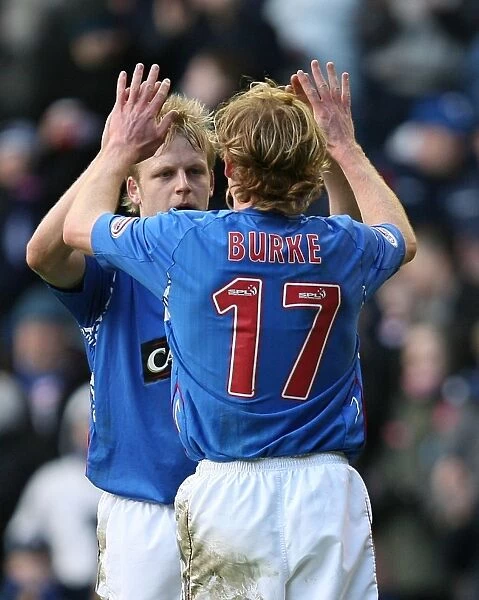 Triumphant Rangers Duo: Chris Burke and Steven Naismith Celebrate Goal Number Three Against St. Mirren (4-2)
