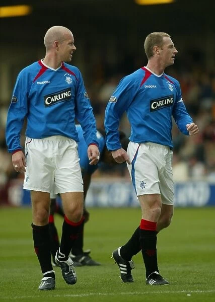 United in Defense: Henning Berg and Craig Moore of Rangers Football Club
