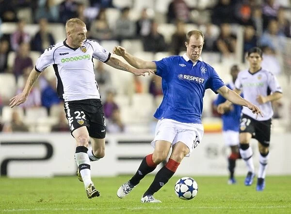 Valencia's Dominance: Whittaker vs. Mathieu in Rangers 3-0 UEFA Champions League Defeat