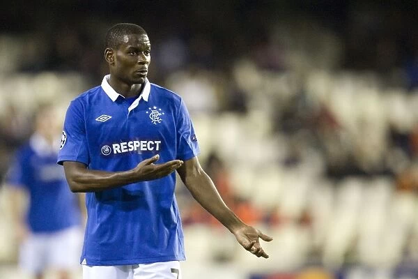 Valencia's Triumph over Rangers: Maurice Edu Faces Defeat (3-0)