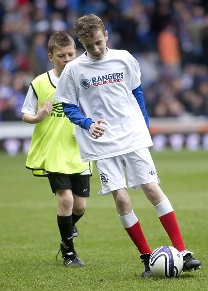 Young Rangers Shine: Third Division Soccer School Matches at Ibrox during Rangers 2-0 Victory over Clyde