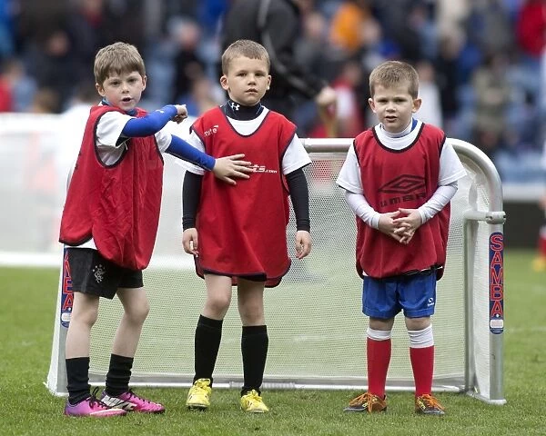 Young Rangers Shine: Half-Time Magic at Ibrox - Rangers Soccer School Kids Play on the Pitch