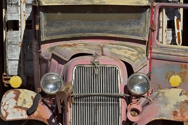 Faded old red Ford flatbed truck at Graeser Winery on Petrified Forest Road, near Calistoga