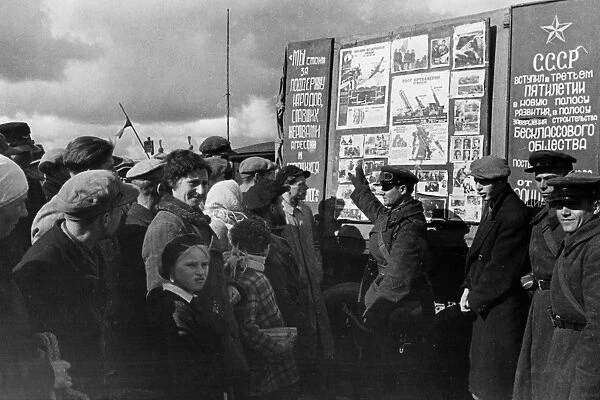 Lieutenant of a soviet tank unit lectures vilno inhabitants about the lives of workers in the ussr, october 1939, vilno, capital of lithuania, was annexed by poland between 1920-1939, occupied by soviet army in september 1939, annexed with the rest of the lithuania to ussr in 1940
