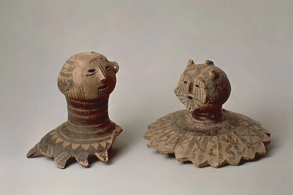 Painted ceramic vessel lids in shape of human head from Gansu, China