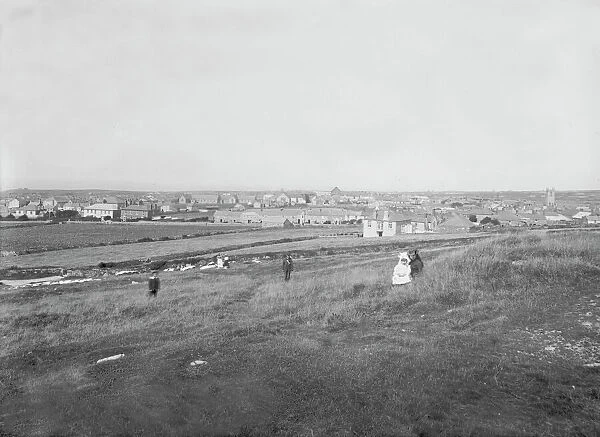 View across the fields to St Just in Penwith Churchtown, Cornwall. Early 1900s