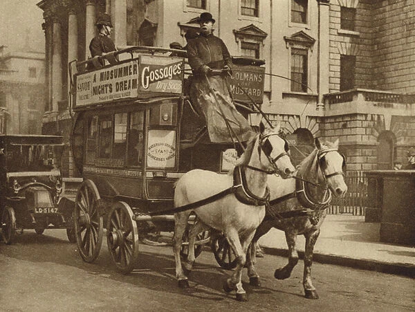 London horse bus of the early 20th Century (b  /  w photo)