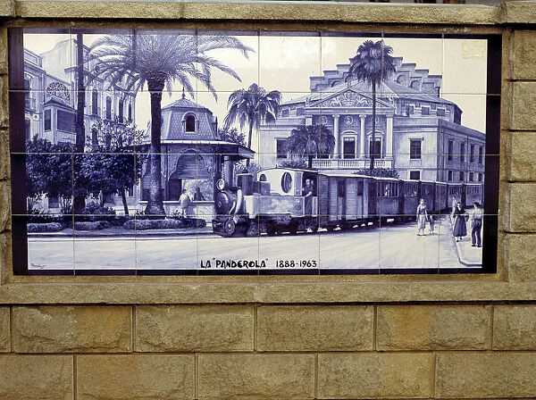 Tile panel representing the old train the Panderola that crossed the city of Castellon